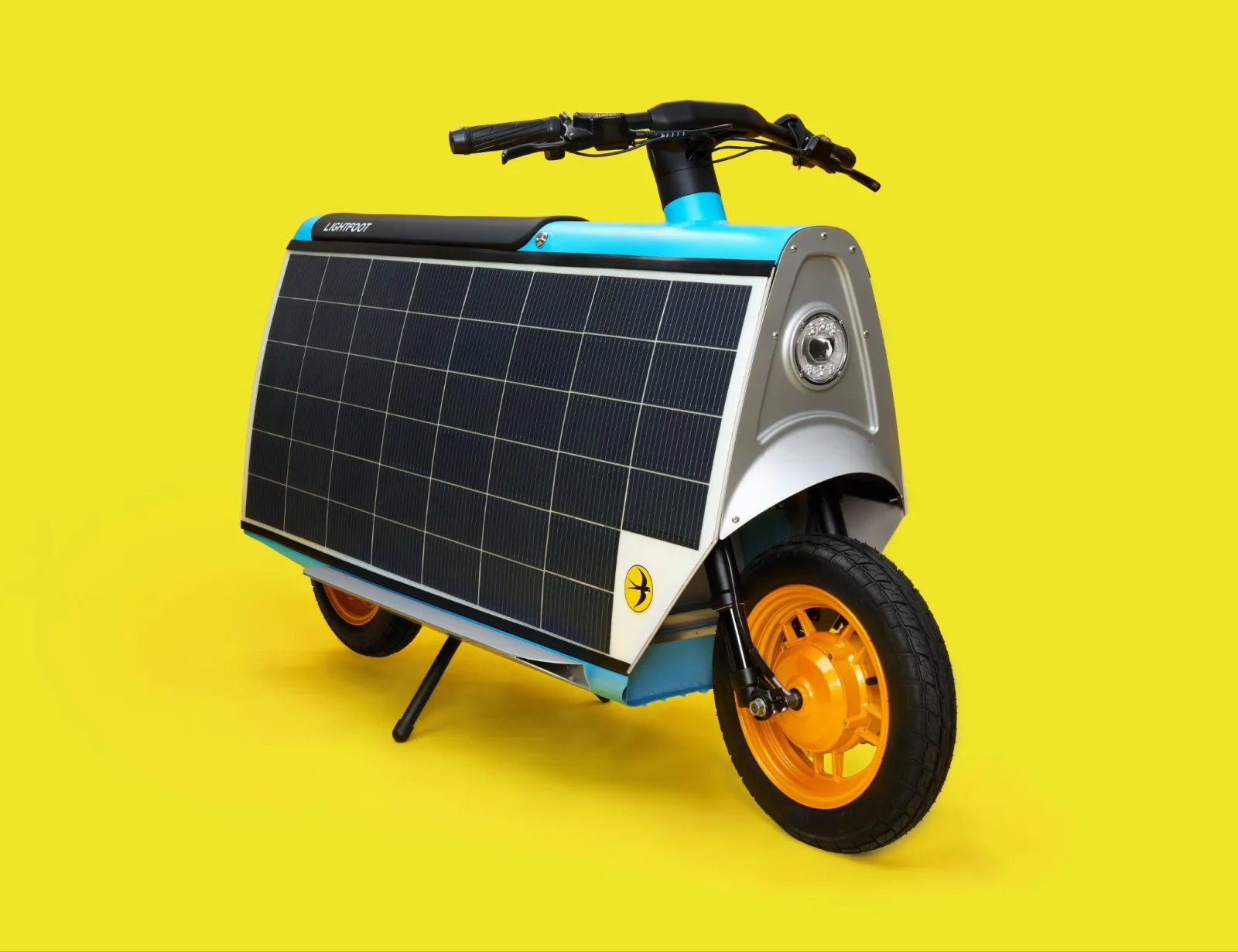 Three-quarter front view of a sky blue Smile Machine on a sun yellow background