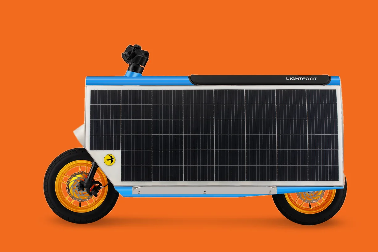 Side profile of a sky blue Smile Machine on a solar orange background